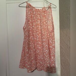 Pink and white spotted tank. Ties in back. EUC. Size large